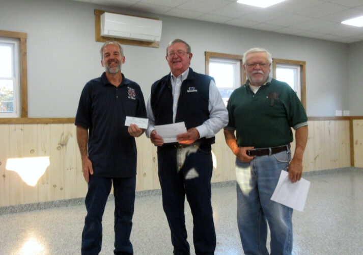 WoodmenLife presents check to fire department